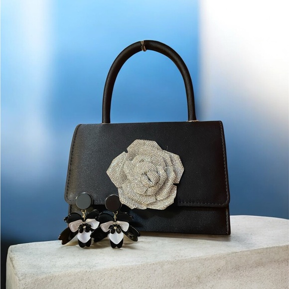 d’margeaux Handbags - Elegant Black Floral Accent Shoulder Bag & Clip-On Earrings